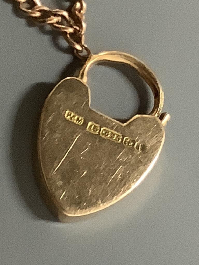 A 15ct gold curb-link bracelet with padlock clasp, 41g